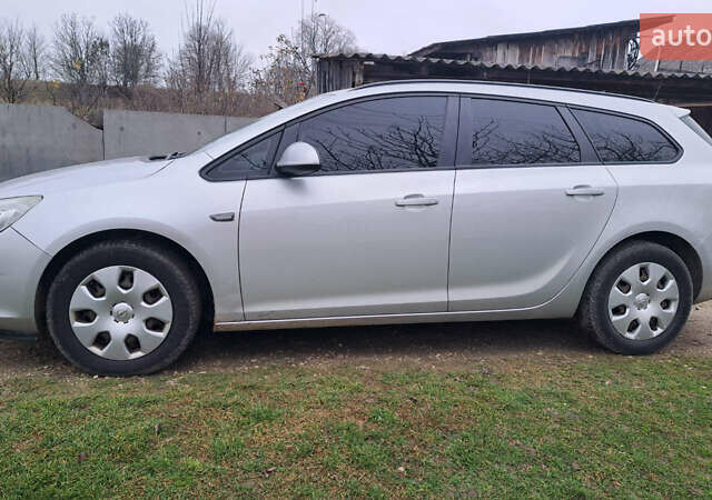 Серый Опель Астра, объемом двигателя 1.69 л и пробегом 210 тыс. км за 6500 $, фото 3 на Automoto.ua