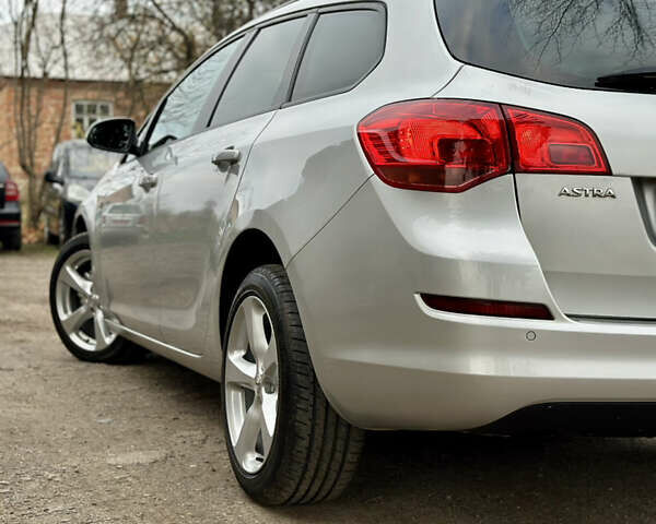 Серый Опель Астра, объемом двигателя 1.6 л и пробегом 148 тыс. км за 7800 $, фото 11 на Automoto.ua