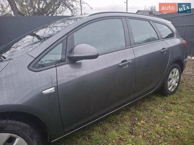 Серый Опель Астра, объемом двигателя 1.69 л и пробегом 317 тыс. км за 5900 $, фото 8 на Automoto.ua