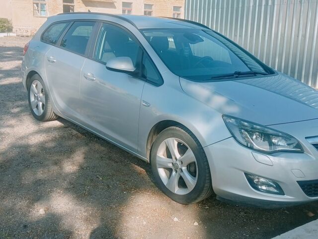 Серый Опель Астра, объемом двигателя 1.2 л и пробегом 266 тыс. км за 6350 $, фото 5 на Automoto.ua