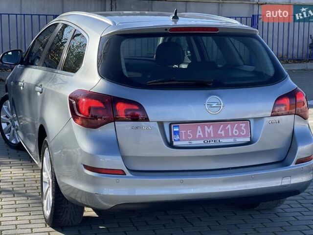 Серый Опель Астра, объемом двигателя 1.7 л и пробегом 259 тыс. км за 7700 $, фото 16 на Automoto.ua
