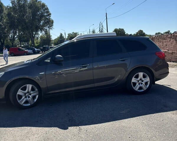 Серый Опель Астра, объемом двигателя 1.69 л и пробегом 208 тыс. км за 7500 $, фото 4 на Automoto.ua