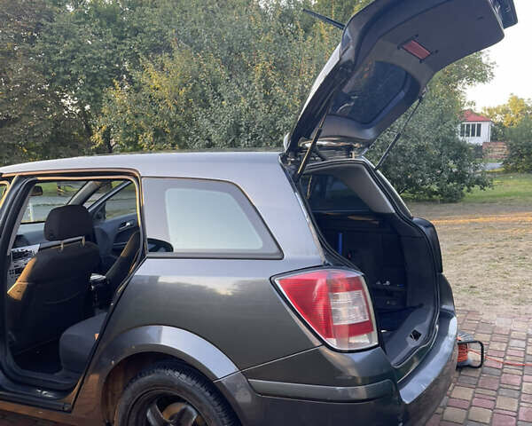 Серый Опель Астра, объемом двигателя 1.6 л и пробегом 164 тыс. км за 6500 $, фото 12 на Automoto.ua