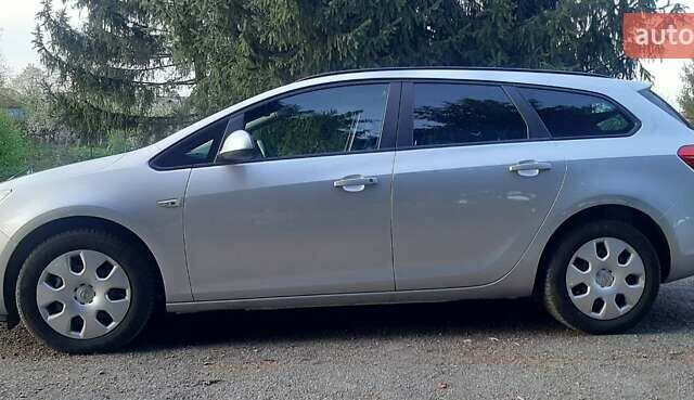 Серый Опель Астра, объемом двигателя 1.7 л и пробегом 248 тыс. км за 6950 $, фото 6 на Automoto.ua