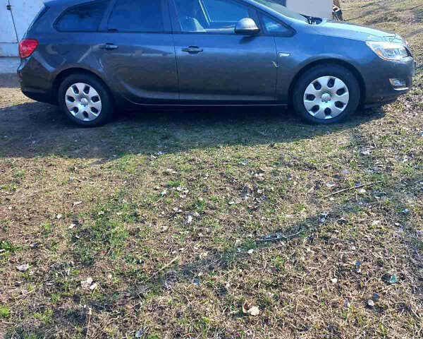 Серый Опель Астра, объемом двигателя 1.6 л и пробегом 140 тыс. км за 8400 $, фото 7 на Automoto.ua