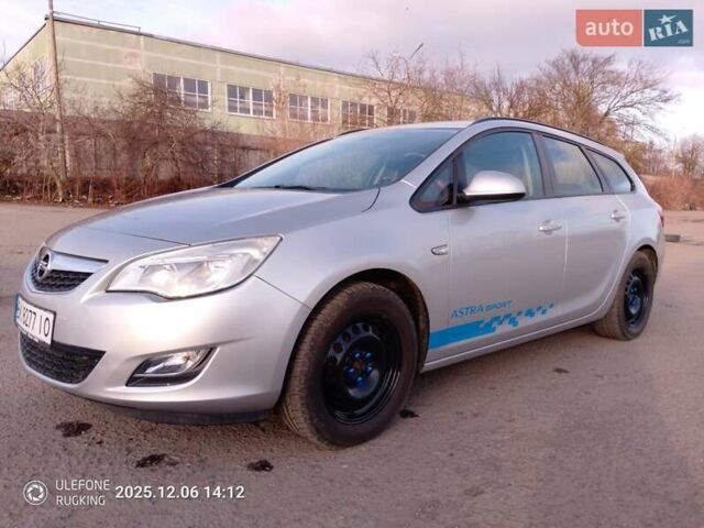 Серый Опель Астра, объемом двигателя 1.4 л и пробегом 183 тыс. км за 5700 $, фото 1 на Automoto.ua