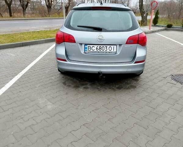 Серый Опель Астра, объемом двигателя 1.25 л и пробегом 254 тыс. км за 5000 $, фото 2 на Automoto.ua