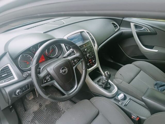 Серый Опель Астра, объемом двигателя 1.2 л и пробегом 266 тыс. км за 6350 $, фото 4 на Automoto.ua