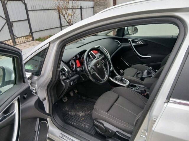 Серый Опель Астра, объемом двигателя 1.7 л и пробегом 266 тыс. км за 7500 $, фото 7 на Automoto.ua