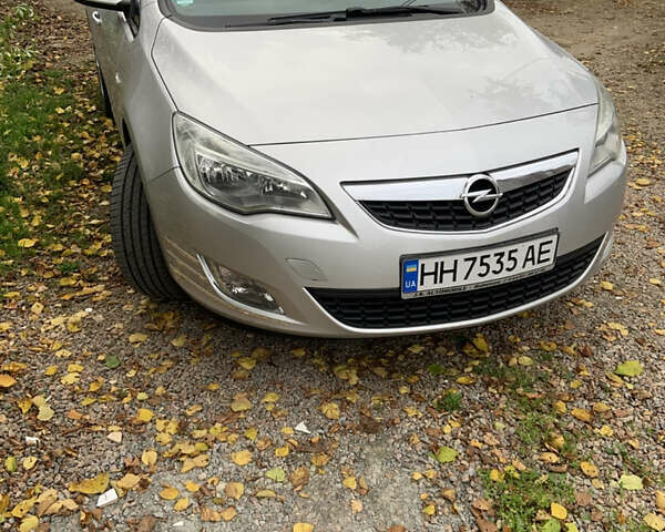 Серый Опель Астра, объемом двигателя 1.69 л и пробегом 230 тыс. км за 7600 $, фото 6 на Automoto.ua