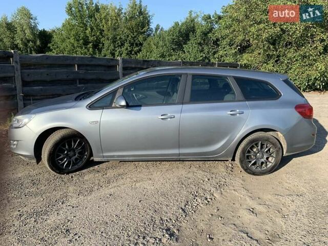 Серый Опель Астра, объемом двигателя 1.6 л и пробегом 219 тыс. км за 6450 $, фото 1 на Automoto.ua