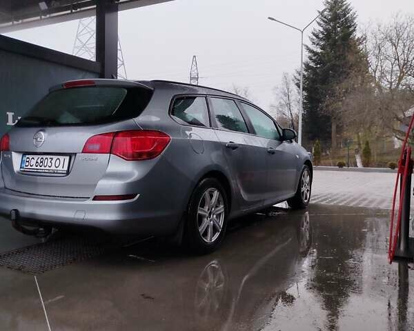Серый Опель Астра, объемом двигателя 1.25 л и пробегом 254 тыс. км за 5000 $, фото 4 на Automoto.ua