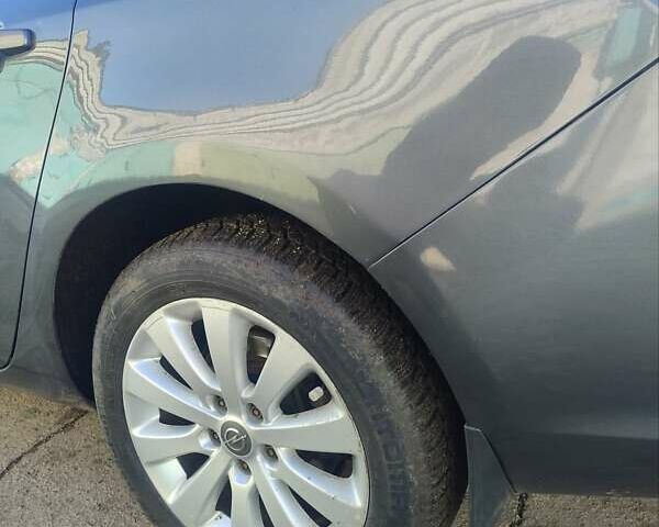 Серый Опель Астра, объемом двигателя 1.7 л и пробегом 265 тыс. км за 6499 $, фото 6 на Automoto.ua