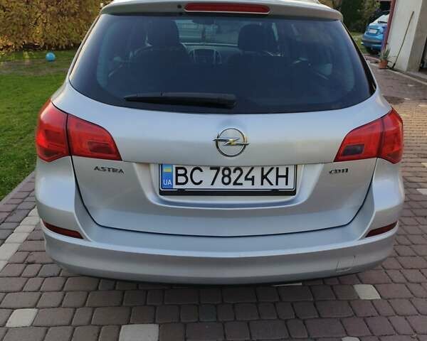 Серый Опель Астра, объемом двигателя 1.7 л и пробегом 309 тыс. км за 7000 $, фото 1 на Automoto.ua