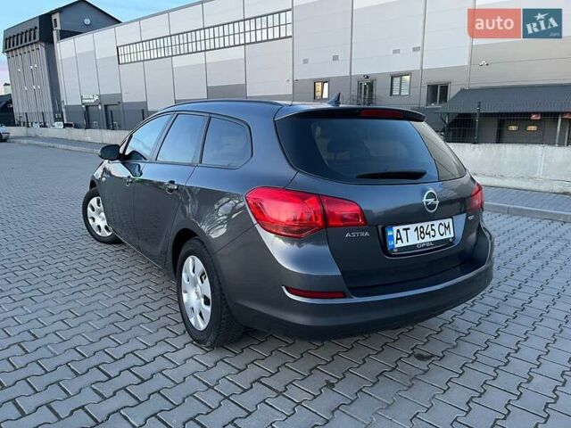 Сірий Опель Астра, об'ємом двигуна 1.7 л та пробігом 244 тис. км за 7000 $, фото 4 на Automoto.ua
