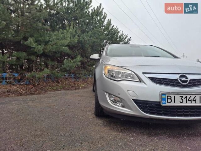 Сірий Опель Астра, об'ємом двигуна 1.4 л та пробігом 300 тис. км за 6400 $, фото 2 на Automoto.ua
