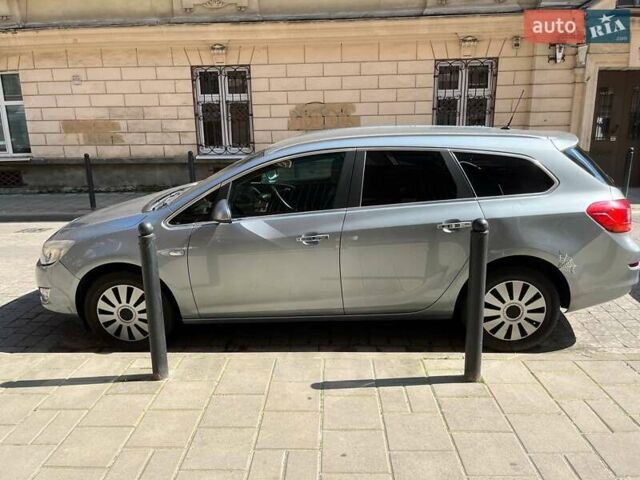 Серый Опель Астра, объемом двигателя 1.25 л и пробегом 247 тыс. км за 8400 $, фото 10 на Automoto.ua