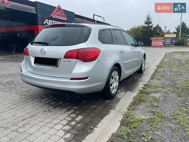 Серый Опель Астра, объемом двигателя 1.2 л и пробегом 289 тыс. км за 5800 $, фото 2 на Automoto.ua