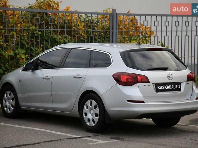 Серый Опель Астра, объемом двигателя 1.69 л и пробегом 233 тыс. км за 7800 $, фото 3 на Automoto.ua