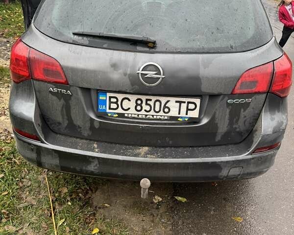 Опель Астра 2011 в Перемышлянах на Automoto.ua Серый Опель Астра, объемом двигателя 1.25 л и пробегом 265 тыс. км за 6900 $, фото 1 на Automoto.ua