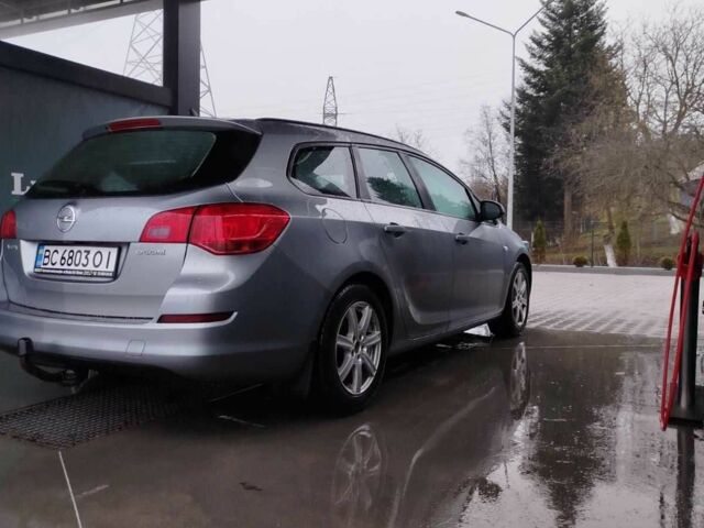 Серый Опель Астра, объемом двигателя 1.2 л и пробегом 254 тыс. км за 5000 $, фото 1 на Automoto.ua