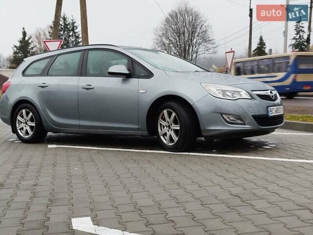 Серый Опель Астра, объемом двигателя 1.25 л и пробегом 254 тыс. км за 5000 $, фото 1 на Automoto.ua