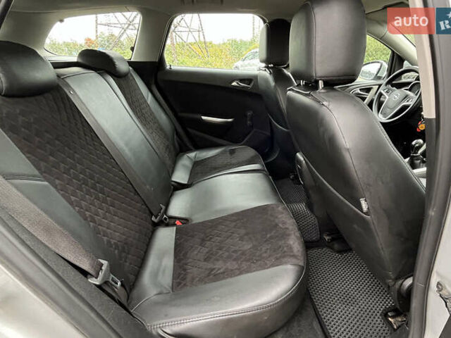 Серый Опель Астра, объемом двигателя 1.25 л и пробегом 238 тыс. км за 5499 $, фото 19 на Automoto.ua