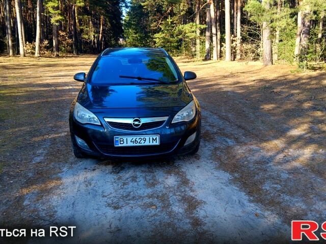 Серый Опель Астра, объемом двигателя 1.2 л и пробегом 220 тыс. км за 5200 $, фото 6 на Automoto.ua