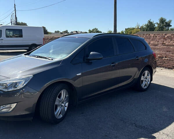 Серый Опель Астра, объемом двигателя 1.69 л и пробегом 208 тыс. км за 7500 $, фото 3 на Automoto.ua