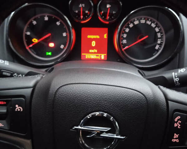 Опель Астра 2011 в Киеве на Automoto.ua Серый Опель Астра, объемом двигателя 1.69 л и пробегом 215 тыс. км за 10000 $, фото 2 на Automoto.ua