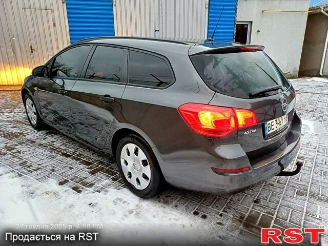 Сірий Опель Астра, об'ємом двигуна 1.2 л та пробігом 220 тис. км за 5999 $, фото 6 на Automoto.ua
