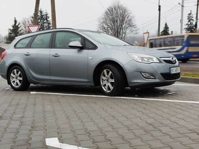 Серый Опель Астра, объемом двигателя 1.2 л и пробегом 254 тыс. км за 5000 $, фото 11 на Automoto.ua