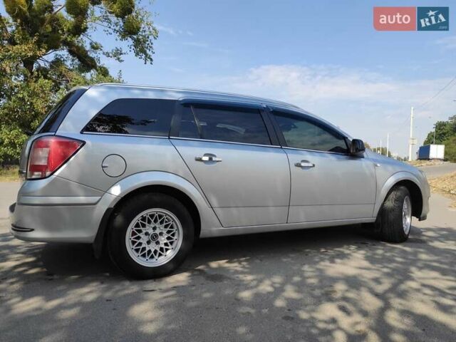 Сірий Опель Астра, об'ємом двигуна 1.69 л та пробігом 253 тис. км за 6350 $, фото 2 на Automoto.ua