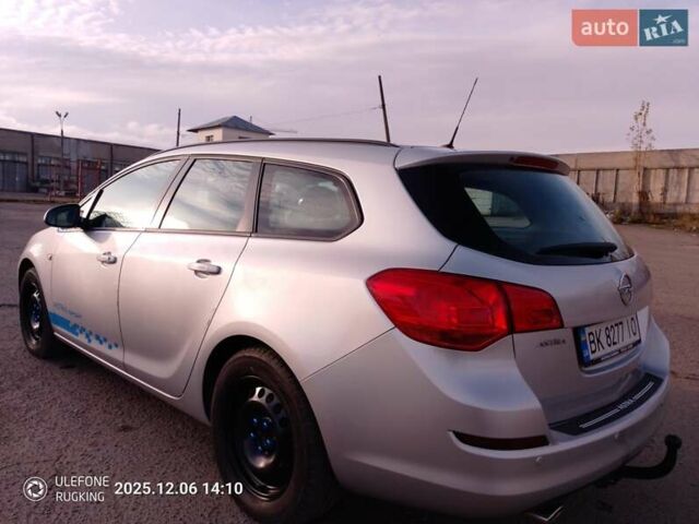 Серый Опель Астра, объемом двигателя 1.4 л и пробегом 183 тыс. км за 5700 $, фото 5 на Automoto.ua