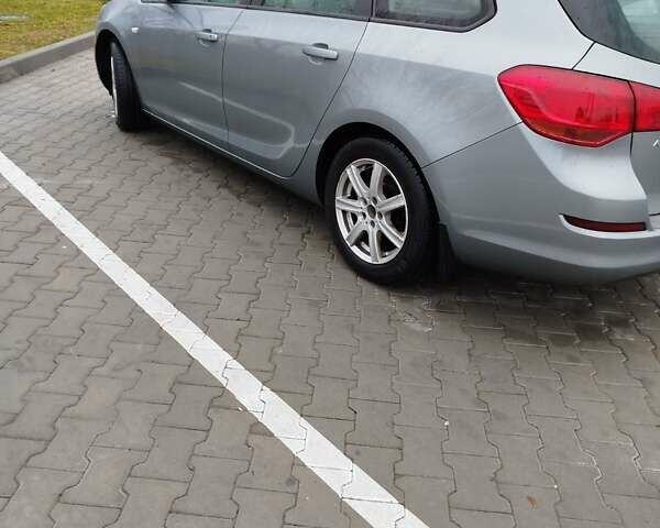 Серый Опель Астра, объемом двигателя 1.25 л и пробегом 254 тыс. км за 5000 $, фото 7 на Automoto.ua