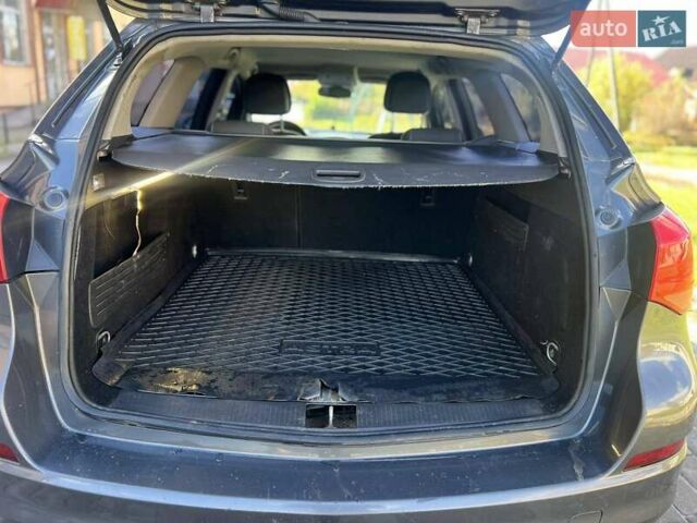 Серый Опель Астра, объемом двигателя 1.2 л и пробегом 294 тыс. км за 5900 $, фото 9 на Automoto.ua