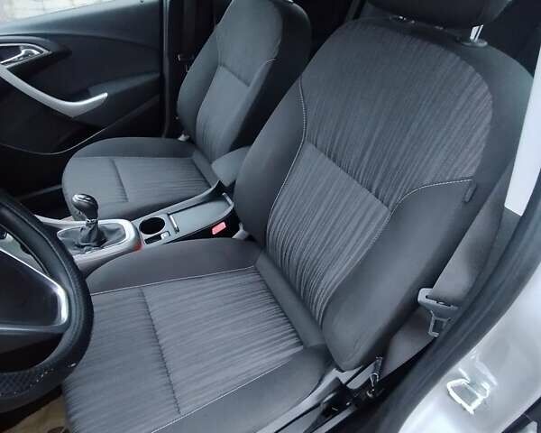 Серый Опель Астра, объемом двигателя 1.3 л и пробегом 236 тыс. км за 6950 $, фото 17 на Automoto.ua