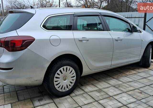 Серый Опель Астра, объемом двигателя 1.7 л и пробегом 266 тыс. км за 7500 $, фото 1 на Automoto.ua