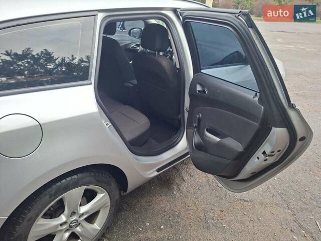 Сірий Опель Астра, об'ємом двигуна 1.4 л та пробігом 300 тис. км за 6400 $, фото 11 на Automoto.ua