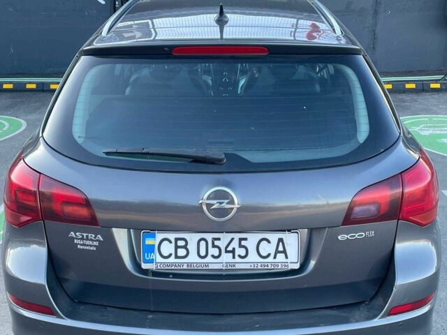 Серый Опель Астра, объемом двигателя 1.3 л и пробегом 256 тыс. км за 6999 $, фото 3 на Automoto.ua