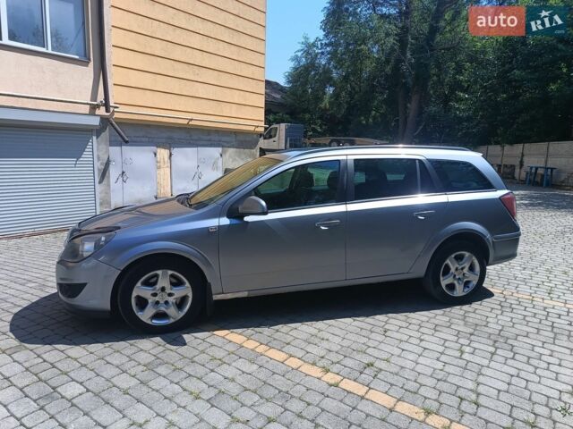 Сірий Опель Астра, об'ємом двигуна 1.69 л та пробігом 348 тис. км за 4400 $, фото 5 на Automoto.ua