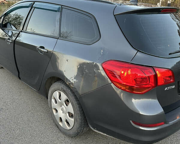 Сірий Опель Астра, об'ємом двигуна 1.25 л та пробігом 261 тис. км за 4100 $, фото 5 на Automoto.ua