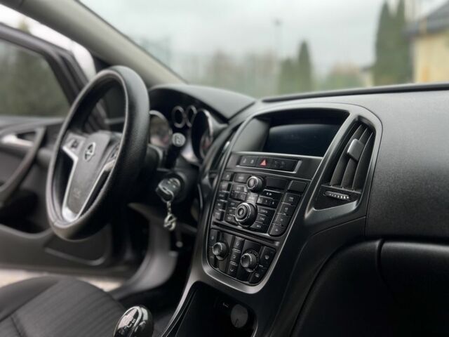 Серый Опель Астра, объемом двигателя 1.2 л и пробегом 264 тыс. км за 4750 $, фото 13 на Automoto.ua