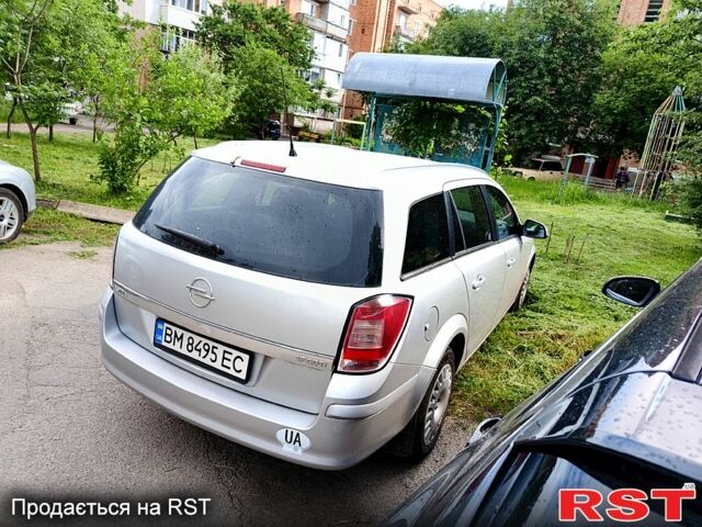 Серый Опель Астра, объемом двигателя 1.7 л и пробегом 220 тыс. км за 5550 $, фото 3 на Automoto.ua