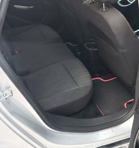 Серый Опель Астра, объемом двигателя 1.4 л и пробегом 183 тыс. км за 6400 $, фото 4 на Automoto.ua