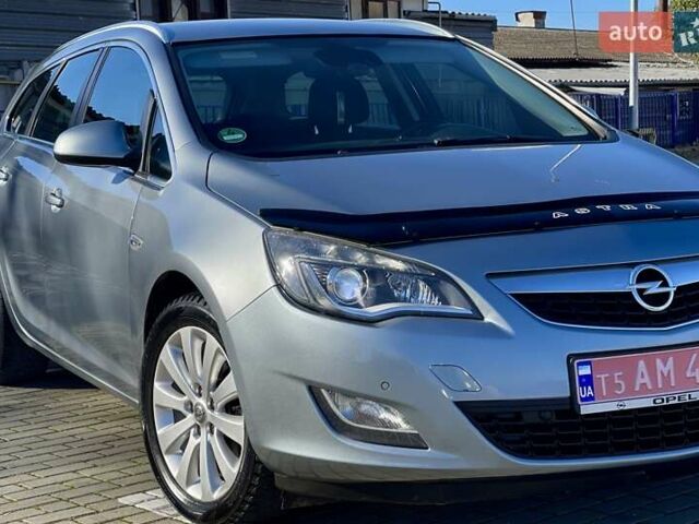 Серый Опель Астра, объемом двигателя 1.7 л и пробегом 259 тыс. км за 7700 $, фото 12 на Automoto.ua