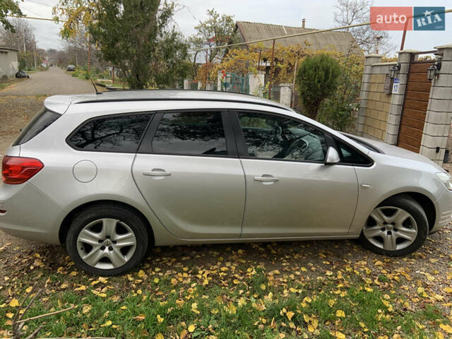 Серый Опель Астра, объемом двигателя 1.69 л и пробегом 230 тыс. км за 7600 $, фото 11 на Automoto.ua