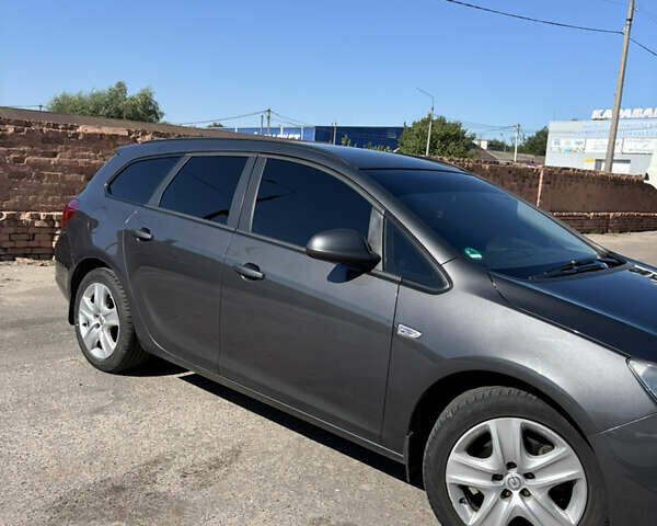 Серый Опель Астра, объемом двигателя 1.69 л и пробегом 208 тыс. км за 7500 $, фото 9 на Automoto.ua