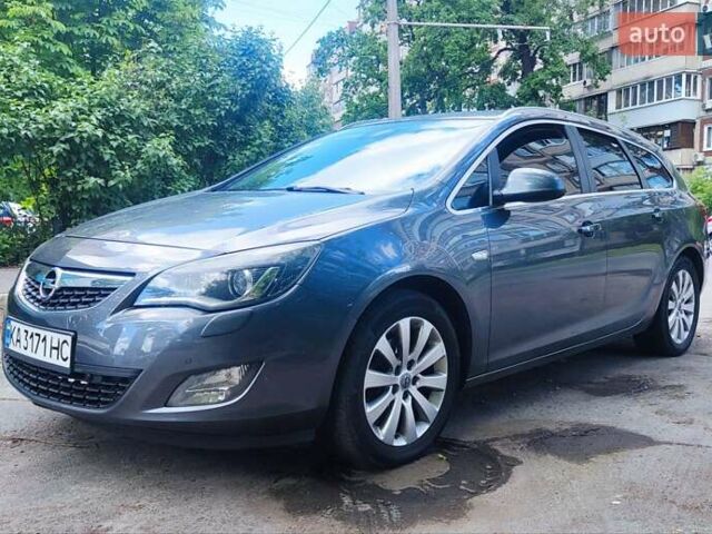 Серый Опель Астра, объемом двигателя 2 л и пробегом 244 тыс. км за 8300 $, фото 7 на Automoto.ua