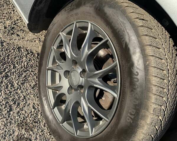 Серый Опель Астра, объемом двигателя 1.6 л и пробегом 219 тыс. км за 6450 $, фото 10 на Automoto.ua